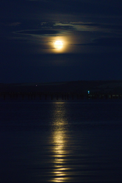 A long exposure portrait of the moon over Cromarty Firth
